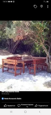 two wooden benches sitting next to a tree at Villa MARINA CANJ 2 in Čanj