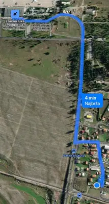 a map of a field with a blue line at Apartment Airport DD in Mitrovići