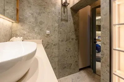 a bathroom with a toilet and a sink at Modular Central Studio in Kotor