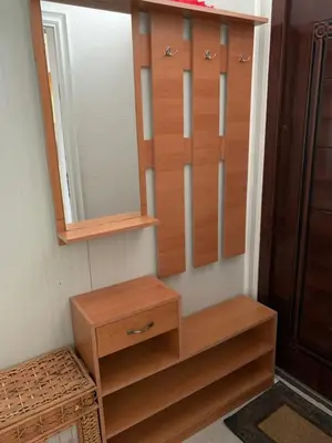 a closet with a mirror and a wooden dresser at Njaro del mar 3 in Petrovac na Moru