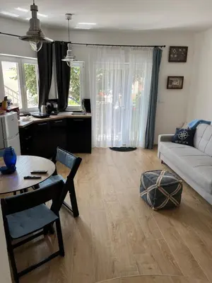 a living room with a couch and a table at M&M Apartments in Kotor