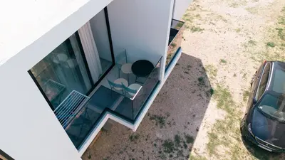 an aerial view of a house with a glass extension at Rine Apartments in Ulcinj