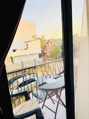 a view of a balcony with a table and chairs at Rine Apartments in Ulcinj