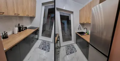 a kitchen with a sink and a refrigerator at Apartman Kika in Sutomore