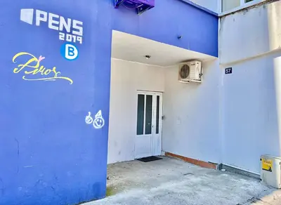 a blue wall of a building with a door at Homestay LGBT friendly - DOUBLE BED ROOM in Budva