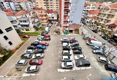 an aerial view of a parking lot with cars at Homestay LGBT friendly - DOUBLE BED ROOM in Budva