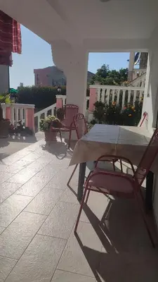 a table and chairs sitting on a patio at Pravo mjesto za odmor in Bar