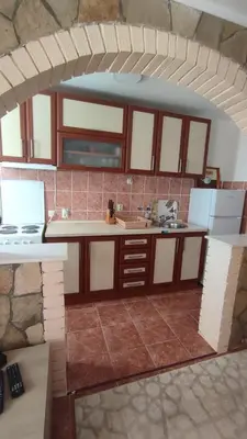 a kitchen with a sink and a counter top at Pravo mjesto za odmor in Bar