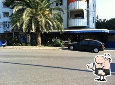 a cartoon character standing in the middle of a street at Garsonjera Ulcinj in Ulcinj