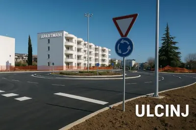 an empty road in front of a building at Garsonjera Ulcinj in Ulcinj