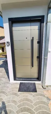 a large garage door on the side of a building at Apartman Vesna in Kotor