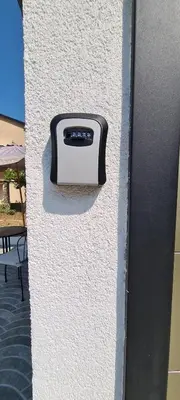 a toaster sitting on the side of a wall at Apartman Vesna in Kotor