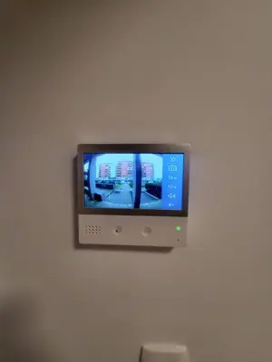 a tv on a wall in a room at Master apartment in Kruševac