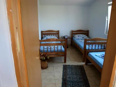a room with two bunk beds in a room at Friendly House in Ulcinj