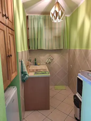 a bathroom with a sink and a mirror at Adriatic Luxury Flat in Budva