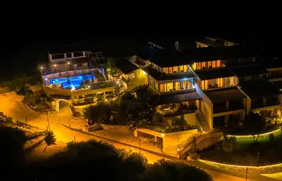 an aerial view of a building at night at Bivalvia Apartments in Ulcinj