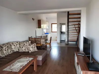 a living room with a couch and a table at Apartment Dasic in Bar