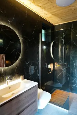 a bathroom with a sink and a toilet and a shower at Amazonas Pirates 4 in Gornji Štoj