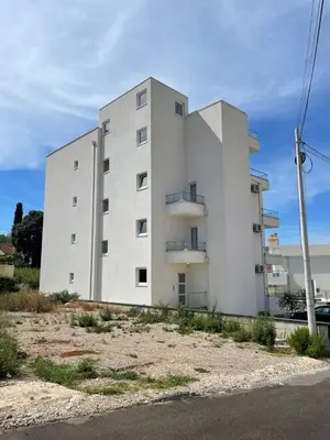 a large white building with a lot of windows at SeaCharm in Dobra Voda