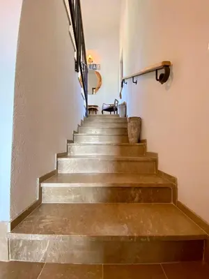 a set of stairs in a building at Villa Nika in Brežani