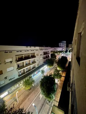 an overhead view of a city street at night at City center 34 in Podgorica