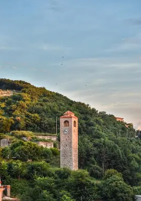 a clock tower in the middle of a hill at Villa Oleander in Ulcinj