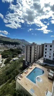 an overhead view of a building with a swimming pool at Sunny Studio in Bečići in Budva