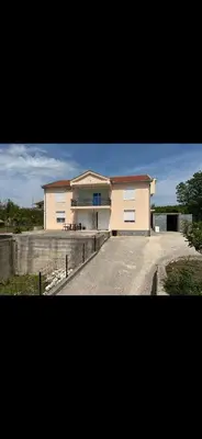 a large house with a driveway in front of it at Kuca Ljepa in Zoganj