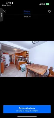 a picture of a kitchen and a dining room with a table at Kuca Ljepa in Zoganj
