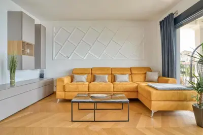 a living room with a couch and a table at Magic view - Apartment with Pool in Budva