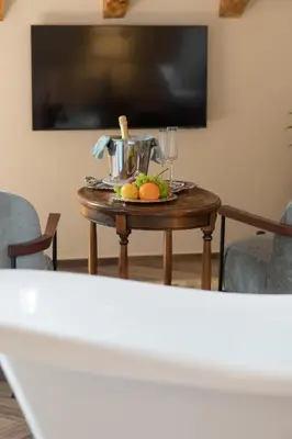 a table with fruit on it in a living room at Kerber-Graz 1860 in Kotor