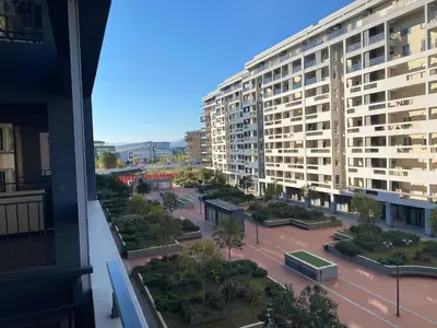 arial view of a city with a large building at Apartman City Kvart Podgorica lux in Podgorica