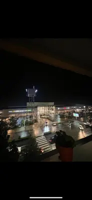 a view of a parking lot at night at Apartman City Kvart Podgorica lux in Podgorica