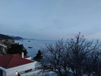 a house with a view of the ocean at Cliff House in Budva