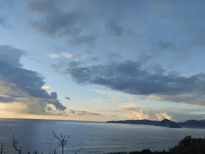 a view of the ocean under a cloudy sky at Cliff House in Budva