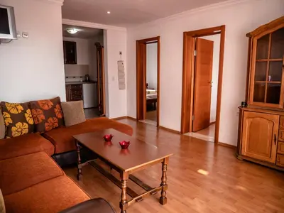 a living room with a couch and a coffee table at Apartments Bonita in Ulcinj