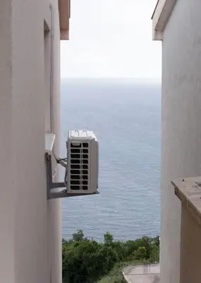 a view of the ocean from a window of a building at Status-M Apartments Seoce 26 in Budva