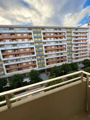 a view of a large apartment building from a balcony at Stan AP Central Podgorica in Podgorica