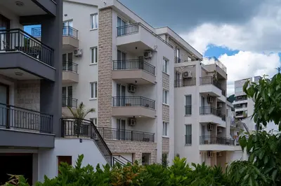 an image of an apartment building with balconies at Sun and Sea Apartments in Budva