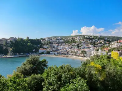 a view of a beach with a city in the background at Villa Blanca in Utjeha