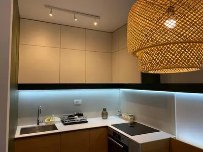 a kitchen with a sink and a counter top at Cozy one bedroom apartment in Podgorica