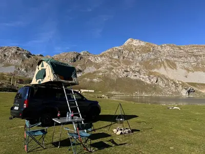 a suv with a camper on top of it at Escape Montenegro Campervan Durmitor in Podgorica