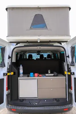 an open trunk of a van with the back door open at Escape Montenegro Campervan Tranzit in Podgorica
