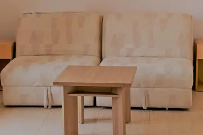 a coffee table and a couch in a living room at Apartments Bettii in Ulcinj