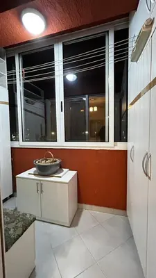 a room with windows and a bowl on a table at Sunrise apartment in Podgorica