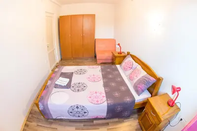 a bedroom with a large bed in a room at Villa Nadezda in Petrovac na Moru