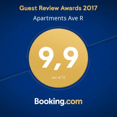 a yellow circle with the text quest review awards applicants rave r at Apartments Ave R in Kotor