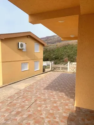 a view of a building with a balcony at Spacious Home with Stunning Mountain and Sea Views , Bar, Dobre Vode Montenegro in Bar