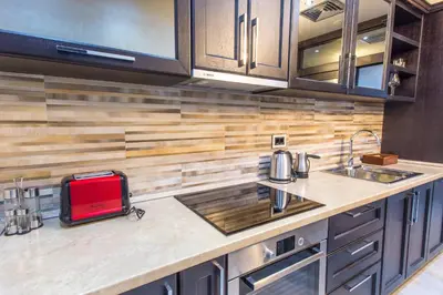 a kitchen with a sink and a counter top at Pearl Apartments in Kotor