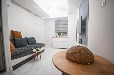 a living room with a couch and a table at CENTAR Apartmant in Bar